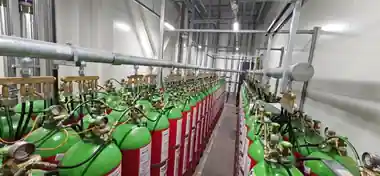 A bank of inert gas suppression cylinders installed by Surefire Safety